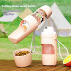 Pink ROAM Bottle with the trough open beside its food cup filled with kibble